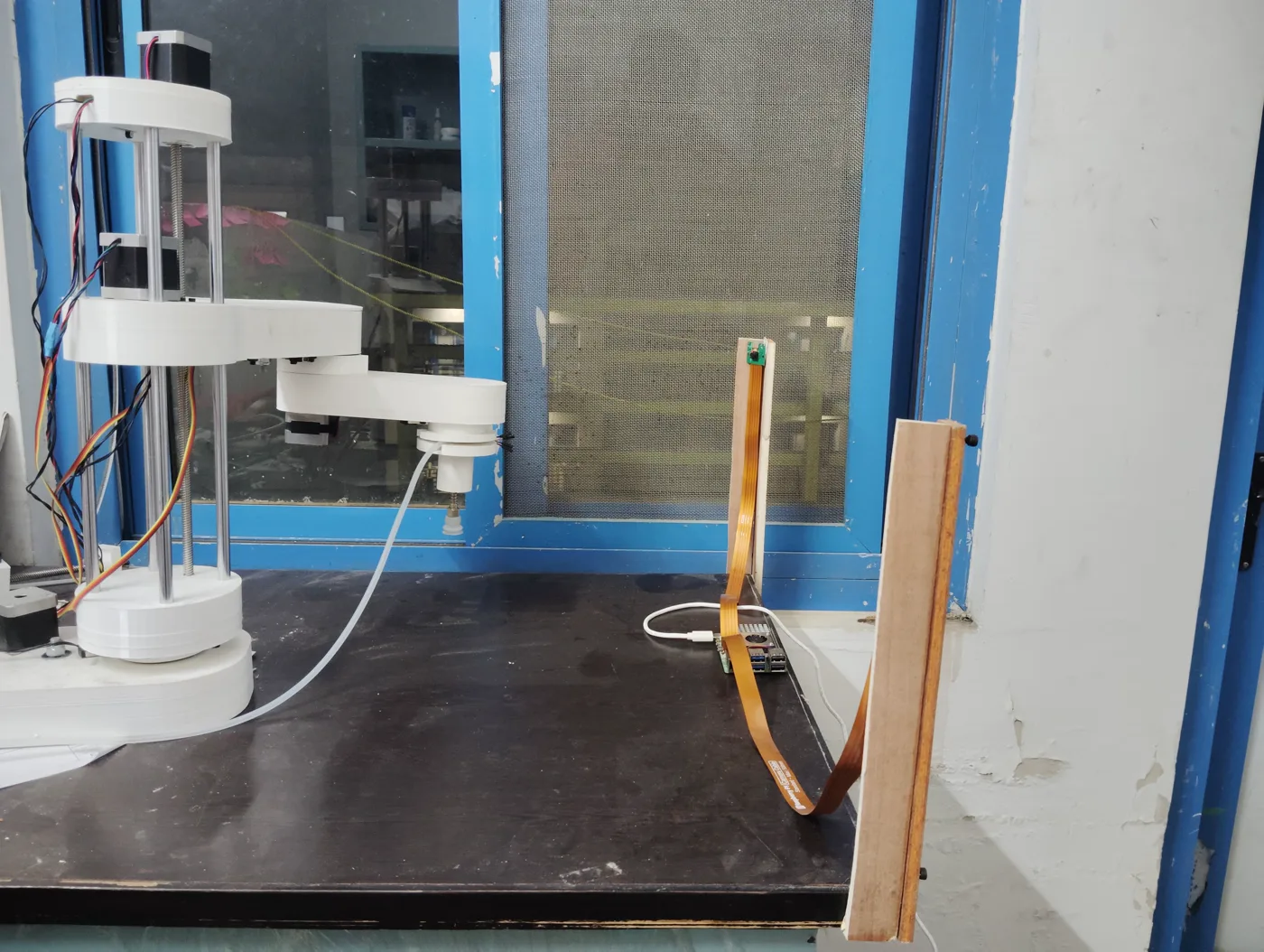 Robotic arm with a dual-camera imitation-learning setup